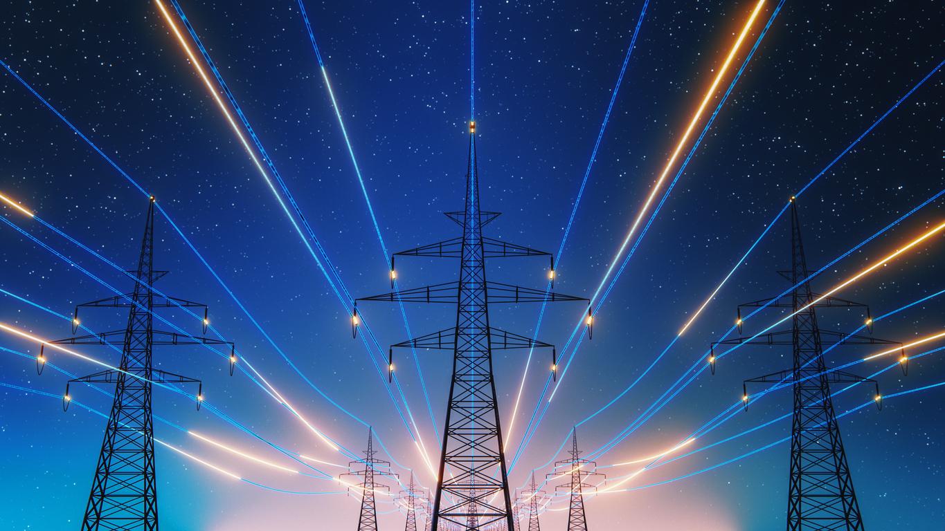 星空を背景に、立ち並ぶ送電鉄塔と光のラインで表現された電力の流れ青とオレンジの光が鉄塔間を放射状に走っている画像